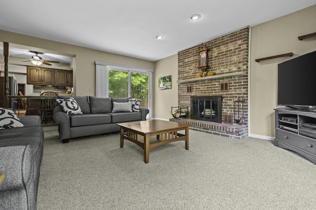 14436 Fairway St, Livonia, MI 48154 - living area featuring light carpet, a brick fireplace, a ceiling fan, and recessed lighting
