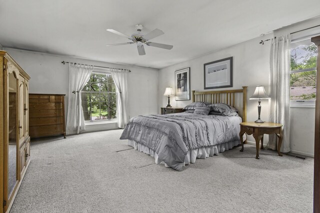14436 Fairway St, Livonia, MI 48154 - bedroom featuring light colored carpet and ceiling fan