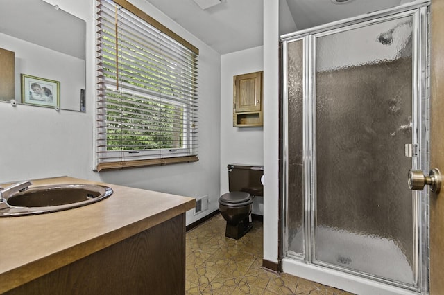14436 Fairway St, Livonia, MI 48154 - bathroom with vanity, toilet, a shower stall, and baseboards