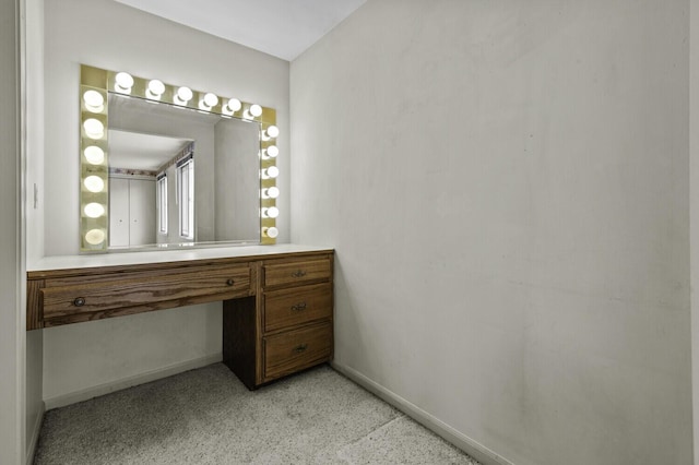 14436 Fairway St, Livonia, MI 48154 - bathroom with baseboards, speckle patterned floor, and vanity