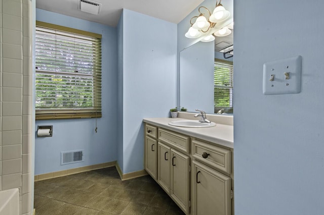 14436 Fairway St, Livonia, MI 48154 - full bathroom with vanity, baseboards, and a bathtub