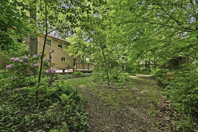 14436 Fairway St, Livonia, MI 48154 - view of yard with a wooden deck