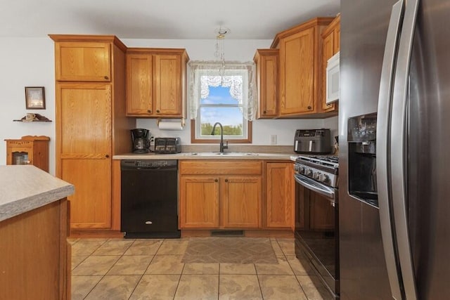 3025 Shawnee Rd, Bridgman, MI 49106 - kitchen with stainless steel fridge, black dishwasher, a sink, gas range oven, and white microwave