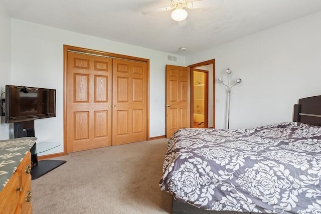 3025 Shawnee Rd, Bridgman, MI 49106 - carpeted bedroom featuring a closet, ceiling fan, and baseboards