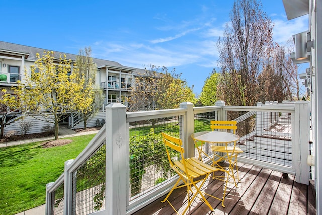2159 New Town Dr NE, Grand Rapids, MI 49525 - deck with a lawn