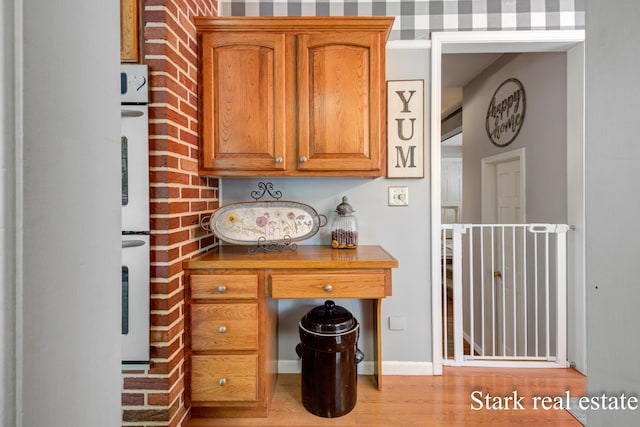 300 N 2nd Ave, Fruitport, MI 49415 - office featuring light wood-style floors and baseboards
