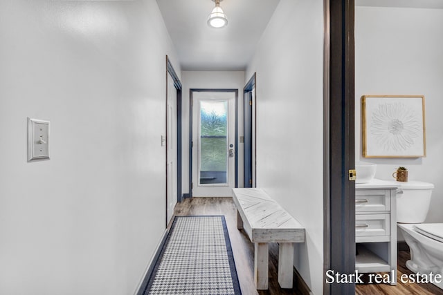 300 N 2nd Ave, Fruitport, MI 49415 - hall with wood finished floors and baseboards