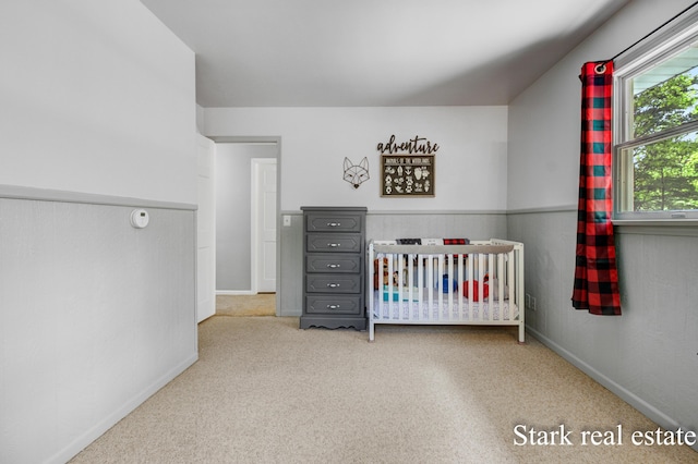 300 N 2nd Ave, Fruitport, MI 49415 - bedroom with a nursery area and baseboards