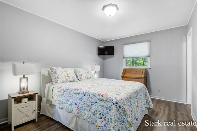 300 N 2nd Ave, Fruitport, MI 49415 - bedroom featuring dark wood-style flooring