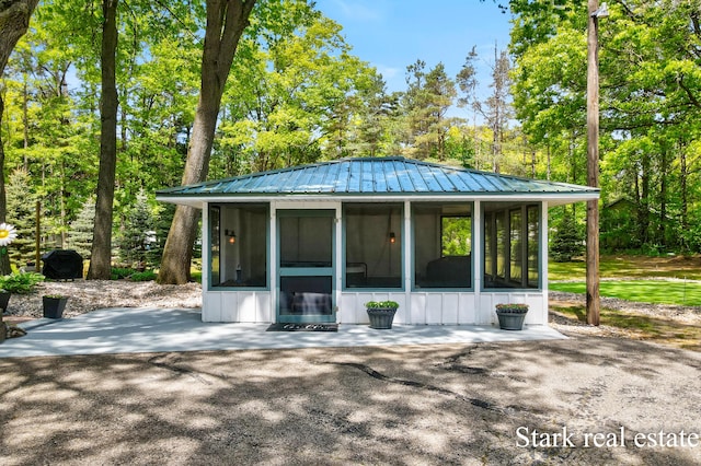 300 N 2nd Ave, Fruitport, MI 49415 - view of patio with a sunroom