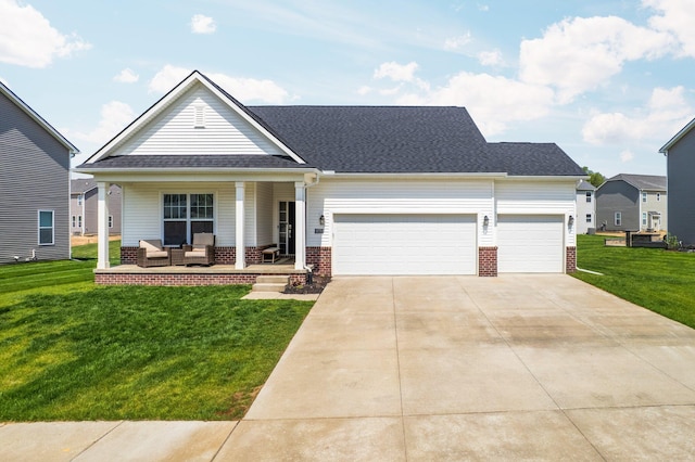 2771 Silo Dr, Saline, MI 48176 - view of front of home with an outdoor living space, a front yard, a garage, brick siding, and driveway