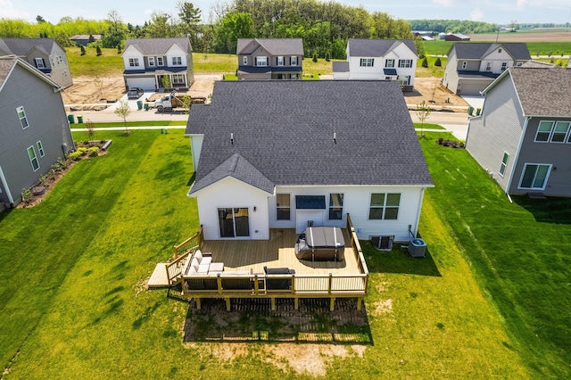 2771 Silo Dr, Saline, MI 48176 - rear view of house with a residential view, a wooden deck, and central AC unit