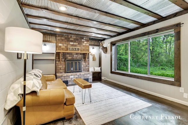 414 135th Ave, Wayland, MI 49348 - living area with baseboards, a brick fireplace, and concrete floors