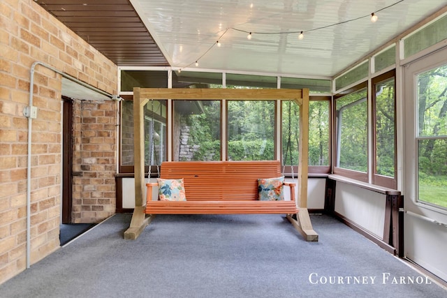 414 135th Ave, Wayland, MI 49348 - sunroom / solarium featuring plenty of natural light and rail lighting