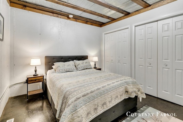 414 135th Ave, Wayland, MI 49348 - bedroom with finished concrete floors and multiple closets
