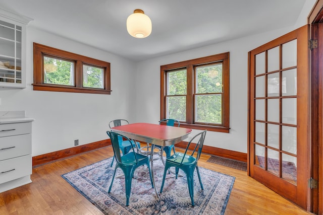 710 S 1st St, Ann Arbor, MI 48103 - dining space with baseboards, plenty of natural light, and light wood-type flooring