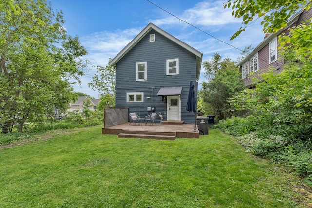 710 S 1st St, Ann Arbor, MI 48103 - back of property featuring a yard and a deck
