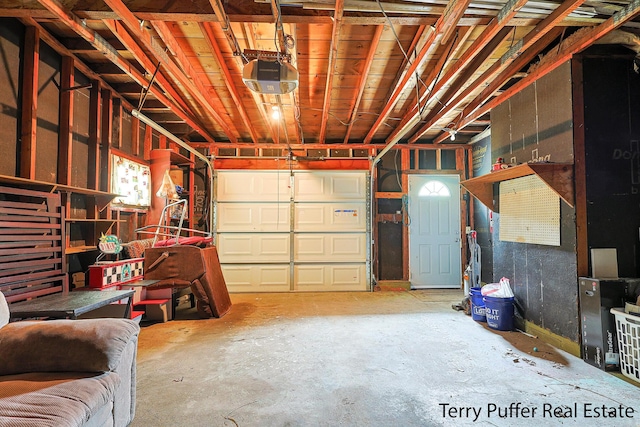 2576 Vine Ave, Muskegon, MI 49442 - garage featuring a garage door opener