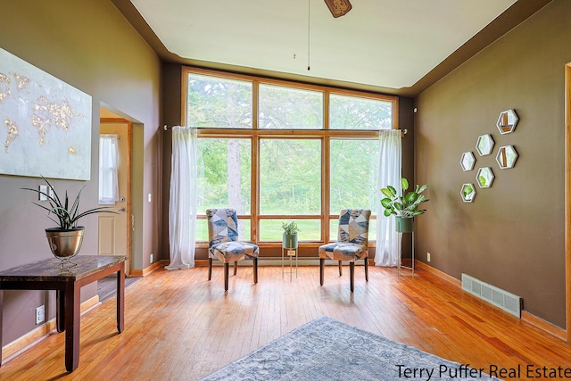 2576 Vine Ave, Muskegon, MI 49442 - sitting room with light wood-type flooring, baseboards, healthy amount of natural light, and ceiling fan