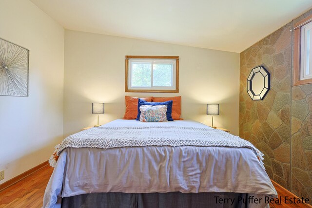 2576 Vine Ave, Muskegon, MI 49442 - bedroom featuring wood finished floors and baseboards