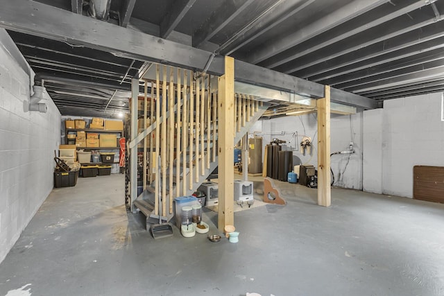 9410 US Highway 12, Brooklyn, MI 49230 - unfinished below grade area featuring stairs and water heater