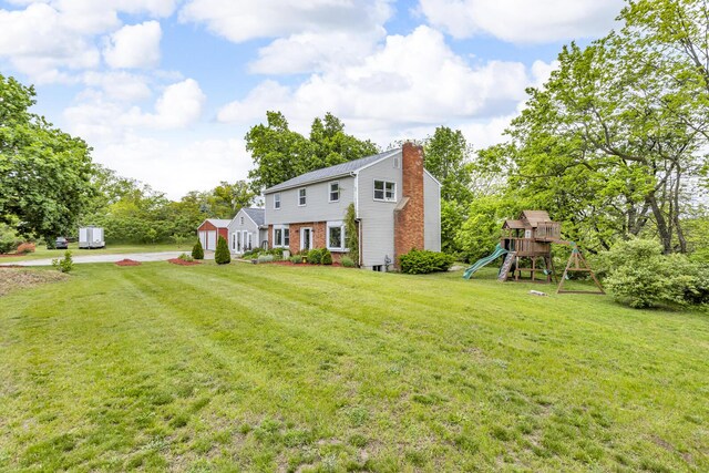 9410 US Highway 12, Brooklyn, MI 49230 - view of green lawn with a playground