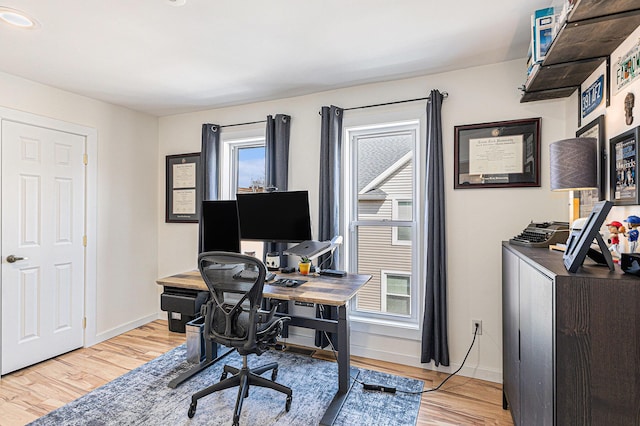 305 Perry St, Albion, MI 49224 - home office with light wood-style floors and baseboards