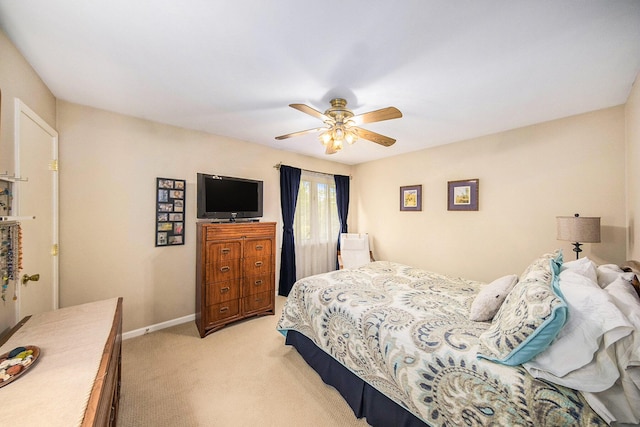 7643 Cottonwood Ln, Dexter, MI 48130 - bedroom featuring light colored carpet, ceiling fan, and baseboards