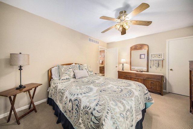 7643 Cottonwood Ln, Dexter, MI 48130 - bedroom with light carpet, baseboards, and a ceiling fan