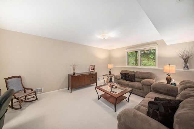 7643 Cottonwood Ln, Dexter, MI 48130 - living area featuring light carpet and baseboards