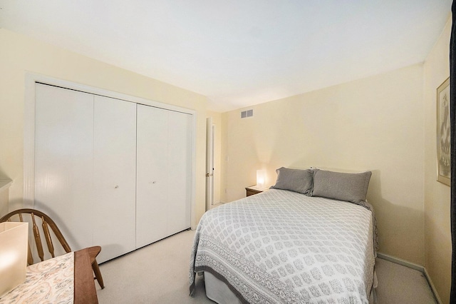 7643 Cottonwood Ln, Dexter, MI 48130 - bedroom with a closet and light carpet