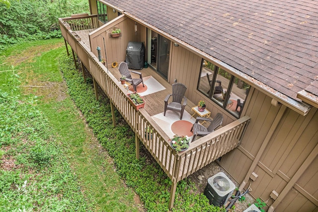 7643 Cottonwood Ln, Dexter, MI 48130 - deck with area for grilling and central air condition unit