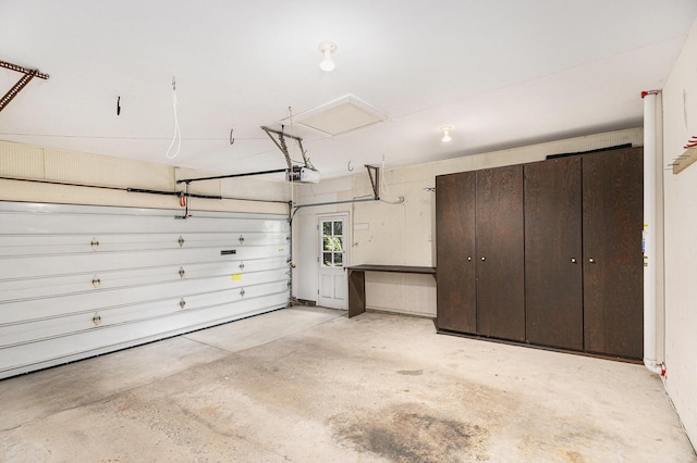 1231 Naples Ct, Ann Arbor, MI 48103 - garage with a garage door opener
