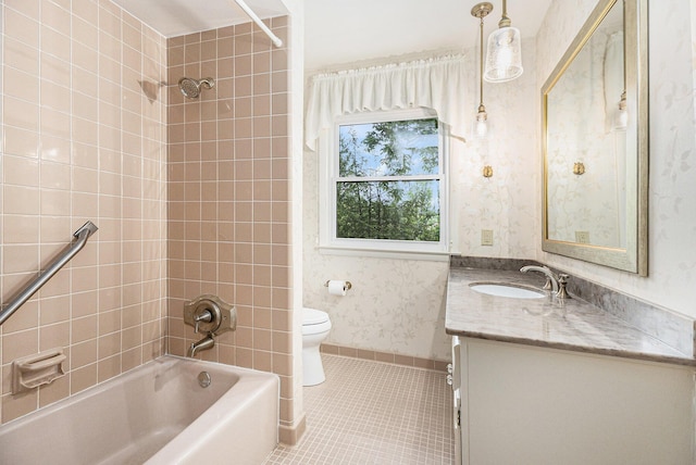 1231 Naples Ct, Ann Arbor, MI 48103 - full bathroom featuring vanity, tile patterned flooring, washtub / shower combination, toilet, and wallpapered walls