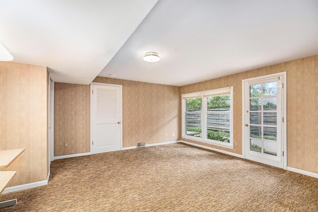 1231 Naples Ct, Ann Arbor, MI 48103 - carpeted spare room featuring baseboards and wallpapered walls