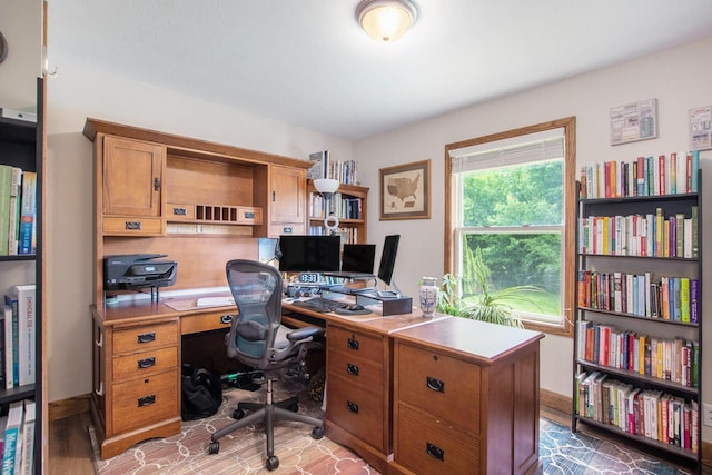9324 Perry St, Zeeland, MI 49464 - office area with light wood-style flooring