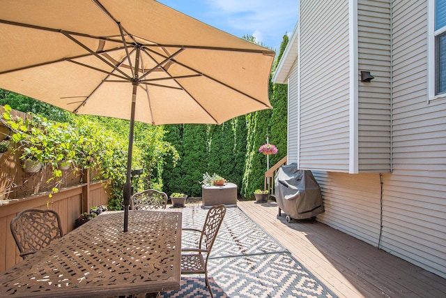 9324 Perry St, Zeeland, MI 49464 - view of patio / terrace featuring outdoor dining area, area for grilling, and a wooden deck