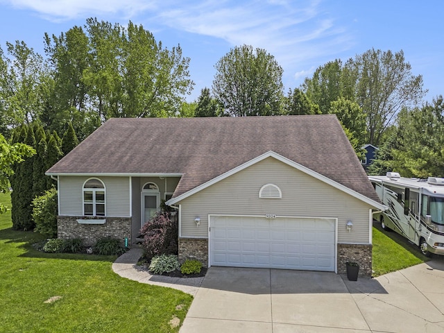 9324 Perry St, Zeeland, MI 49464 - view of front of home with driveway, a garage, a front lawn, brick siding, and a shingled roof
