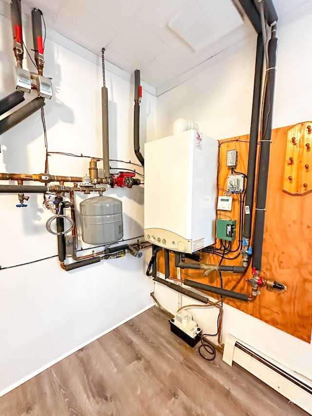 4307 N Mac Rd, Irons, MI 49644 - utilities featuring a baseboard radiator and water heater