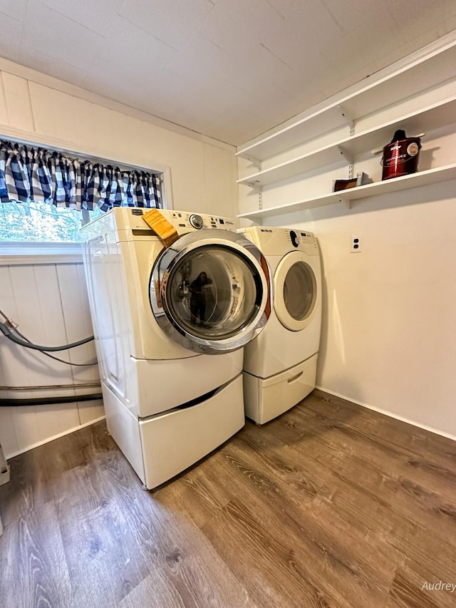 4307 N Mac Rd, Irons, MI 49644 - washroom featuring washing machine and dryer and wood finished floors