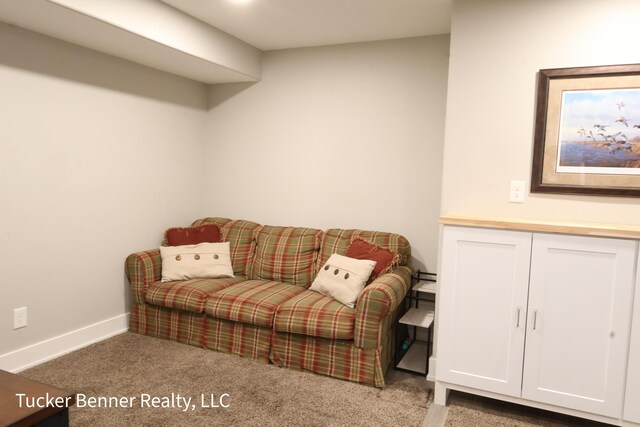 239 Monroe Ave, Muskegon, MI 49441 - sitting room with baseboards and carpet