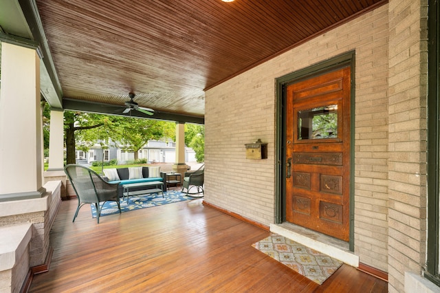 903 Lake Blvd, Saint Joseph, MI 49085 - property entrance featuring a porch, brick siding, and ceiling fan
