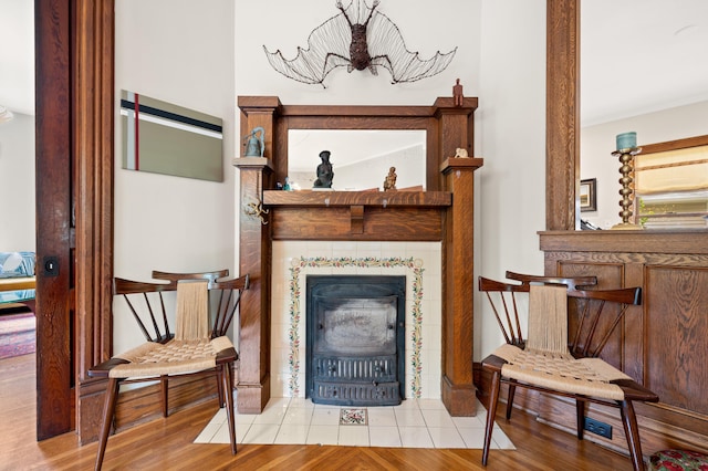 903 Lake Blvd, Saint Joseph, MI 49085 - detailed view of a chandelier, wood finished floors, and a tiled fireplace