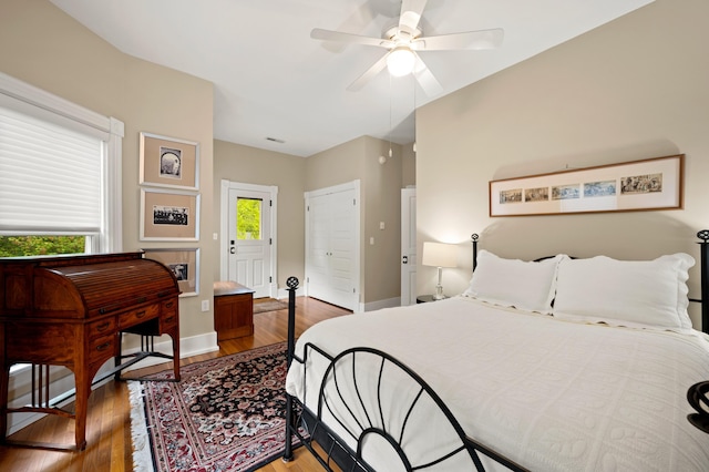 903 Lake Blvd, Saint Joseph, MI 49085 - bedroom featuring wood finished floors, baseboards, and ceiling fan