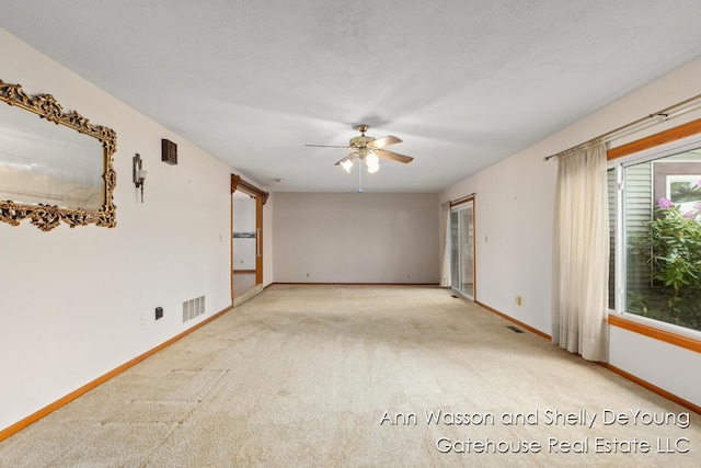 171 Dickerson Vw SW, Stanton, MI 48888 - unfurnished room featuring a ceiling fan, carpet flooring, and baseboards