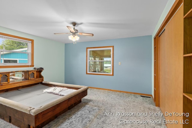 171 Dickerson Vw SW, Stanton, MI 48888 - bedroom featuring carpet flooring, baseboards, and ceiling fan
