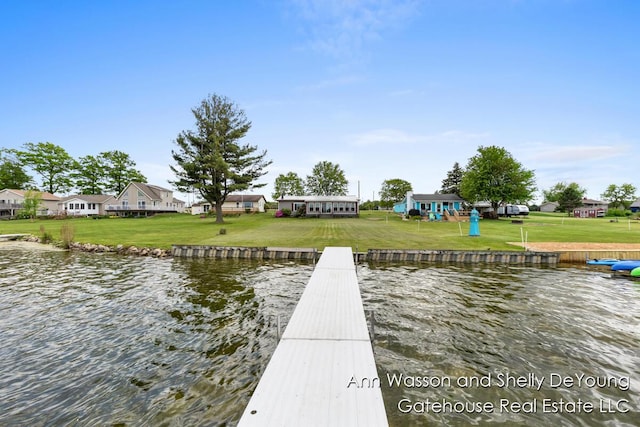 171 Dickerson Vw SW, Stanton, MI 48888 - dock featuring a water view and a lawn