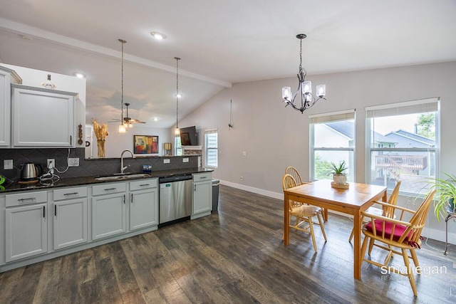 8637 Rainbows End Rd SE, Caledonia, MI 49316 - kitchen with stainless steel dishwasher, a peninsula, healthy amount of natural light, and dark wood finished floors