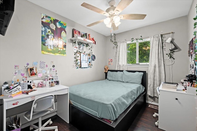 35519 Canyon Dr, Westland, MI 48186 - bedroom featuring an office area, dark wood-style flooring, and a ceiling fan