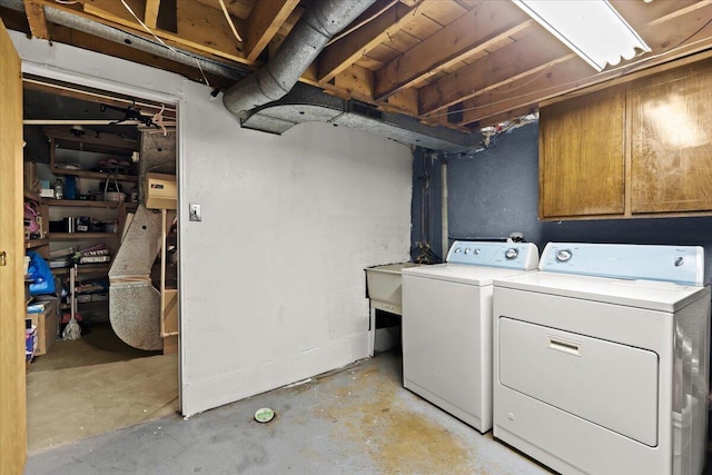 35519 Canyon Dr, Westland, MI 48186 - laundry area featuring independent washer and dryer and cabinet space
